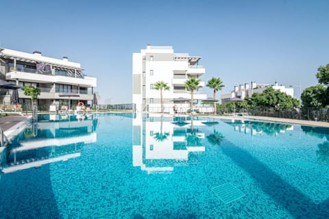 Garden Spill Apartment in Estepona
