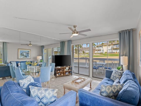 Overlooking the golf course in Destin, Florida, this bright coastal retreat offers relaxing views, comfortable living spaces, and easy access to white-sand beaches, dining, golf, and local attractions along the Emerald Coast.