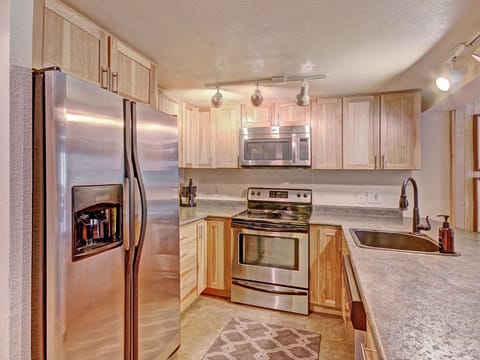 Nicely updated kitchen features stainless steel appliances.