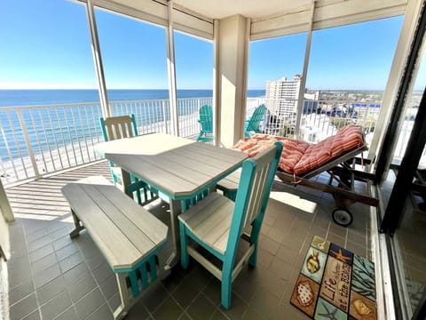 Lounge on your private balcony with a good book and views of the coastline.  Seating for many while watching the waves!