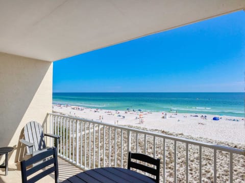 The balcony includes quality outdoor seating to enjoy your morning coffee..or mimosa.