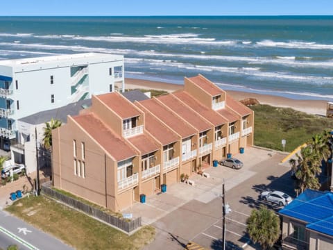 Just steps from the beach, this spacious three-story townhome is the perfect home base for your South Padre Island getaway.