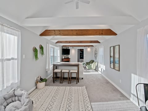 This is our "great room." A naturally lit, vaulted ceiling, living space perfect for cuddling up and spending quality time with family.