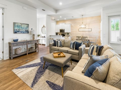 This welcoming living space is perfect for unwinding after beach days, sharing laughs, relaxing together, and enjoying slow, memorable moments on your coastal vacation.