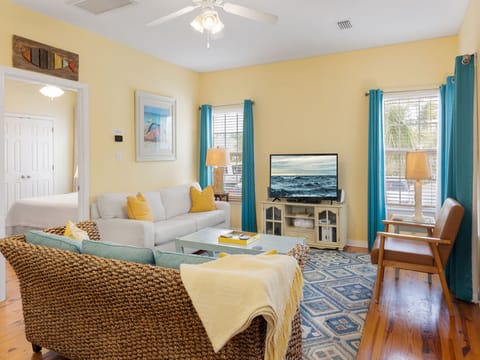 The open living area ensures quality time can be spent together while relaxing on any of the comfortable seating provided.