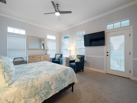 Master Bedroom located on the third floor features a King Bed and direct balcony access!