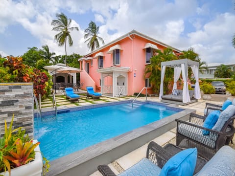 Amazing pool area with day-bed, sun loungers and comfortable chairs
