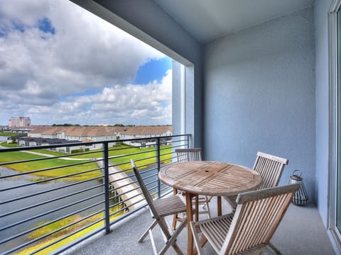 Balcony with wooden dining set perfect for al fresco dining