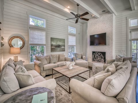 Living Room with Custom Fireplace and Plenty of Seating for All to Gather Around
