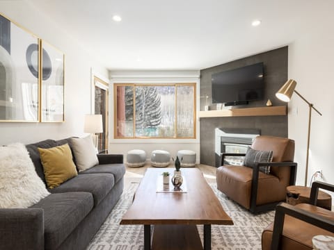 Living room with views of aspen tree groves