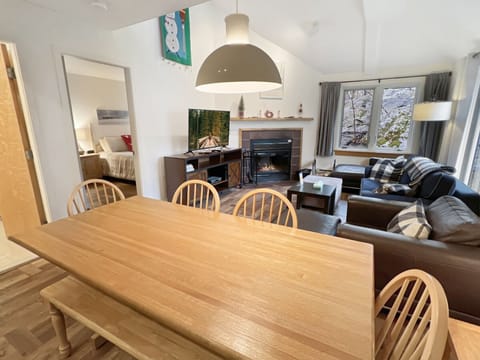 Dining table with a bench and four chairs