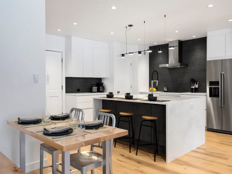 Dining area seats 4 plus counter space for dining.