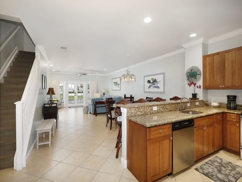Kitchen opens to dining and living area