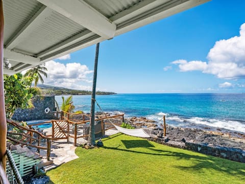 Use the hammock under the palm tree for ultimate relaxation