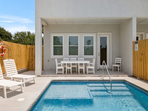Ample seating in shaded patio area to enjoy the island climate