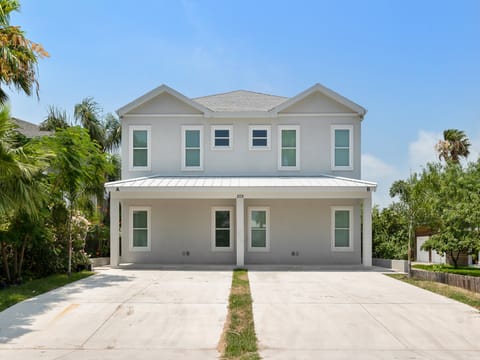 Welcome to newly constructed 209B W. Retama! Your townhome is on the right