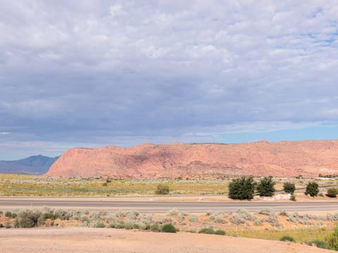Majestic balcony views of Snow Canyon's rock formations.