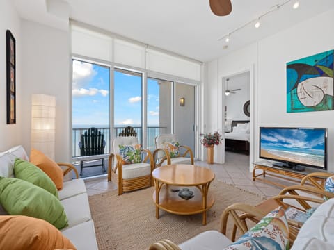 Living Area surrounds a flat screen TV with beautiful views to the ocean!