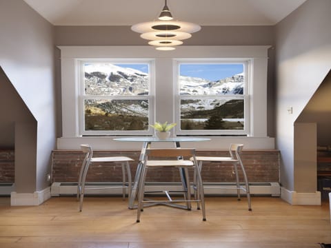 Coffee/breakfast/wine table looking out to the stunning views of Ajax mountain and the Telluride Valley.