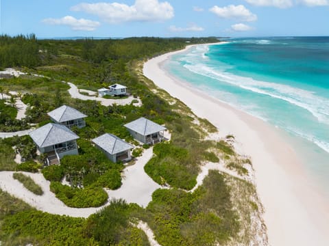 Welcome to the Bohemia Estate, a private 3-acre estate located directly on a mile-long pink-sand beach near Governors Harbour.