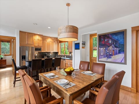 This Spacious Gourmet Kitchen features stainless steel appliances, a 4 burner gas stove, microwave and dishwasher.