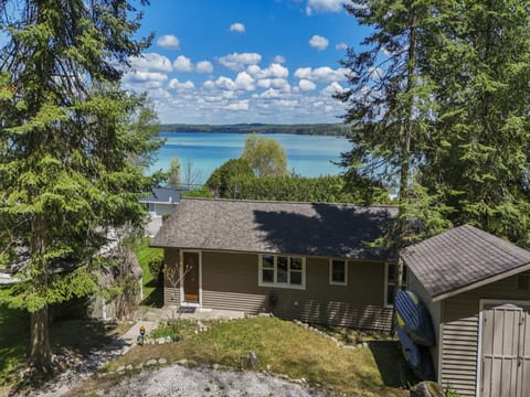 Rear of the house with parking from the private road and convenient entry