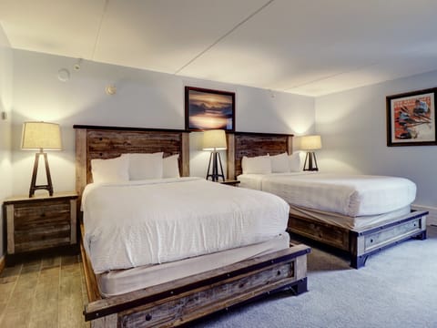 Hotel room offers 2 queen beds.