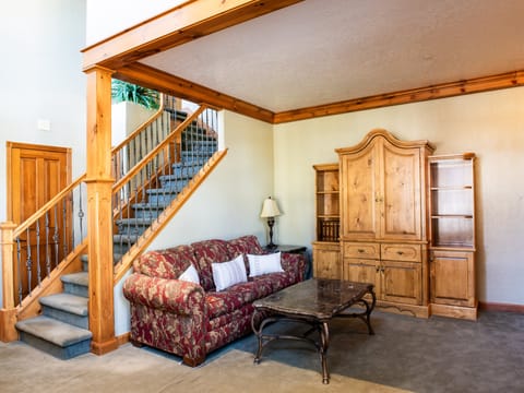 Living room offers sleeping for 2 in sofa sleeper.