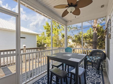 A spacious screened porch with plenty of seating is featured for spending time outdoors without having to battle the outdoor elements.