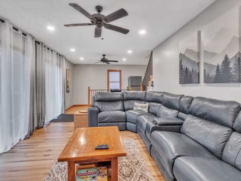 Main-level living space with two large sliding doors for a breathtaking view of the lake.