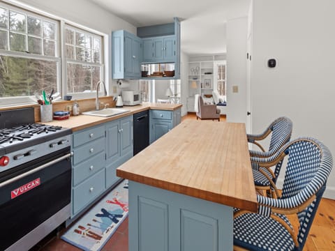 Generously-sized kitchen island, ideal for meal prep and gathering.