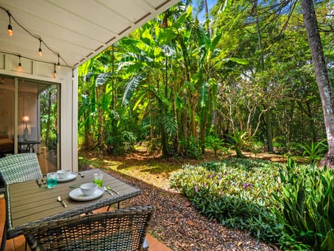 Enjoy your coffee surrounded by the peaceful beauty of a banana grove.
