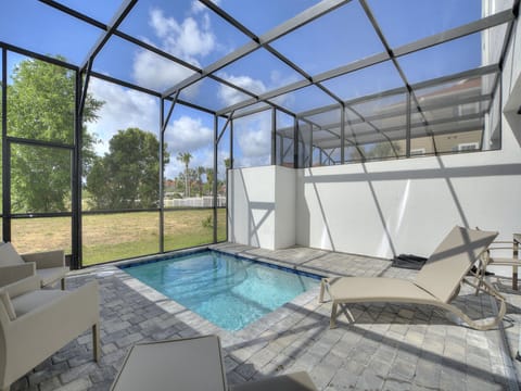 Relaxing Poolside Retreat with Enclosed Lanai