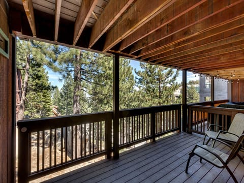 A spacious covered balcony, perfect for taking in the mountain views.