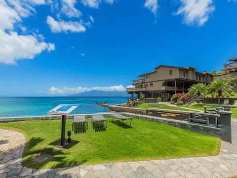 Lounge on the grass with stunning ocean views.