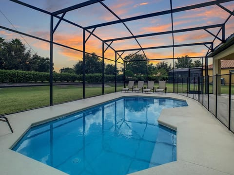 Sparkling private pool with sunset views, perfect for a relaxing getaway.