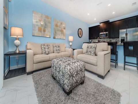 Relax in the stylish living space with modern furnishings and a cozy ambiance.