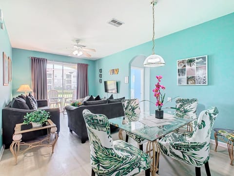 Spacious and stylish living area with vibrant decor, perfect for relaxing after a day of adventures.