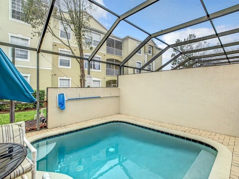 Relax in your private screened pool, ideal for sunny days.