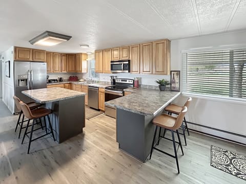 Spacious Kitchen with Two Bar Areas