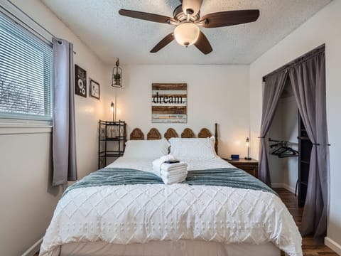 The master bedroom offers a spacious king-sized Sleep Number bed...