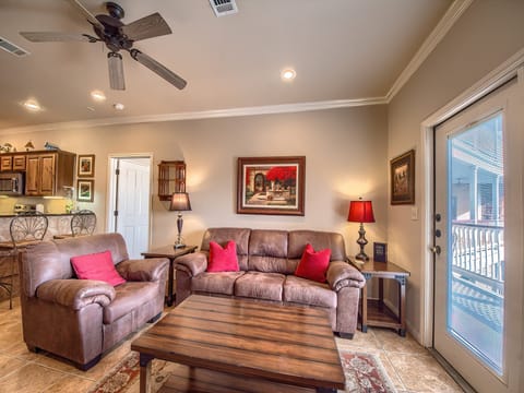 The living room has a sofa sleeper!