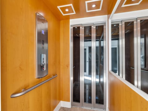 The elevator reaches all three floors of the house
