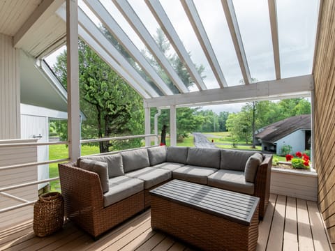 Spacious covered deck just off the living room - great for relaxing outdoors in any weather.