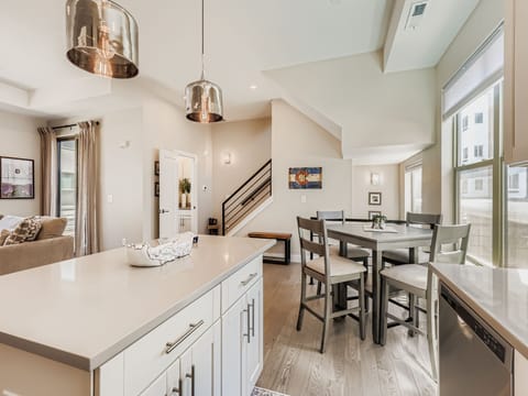 Cook dinner while your guests relax in the attached dining space.