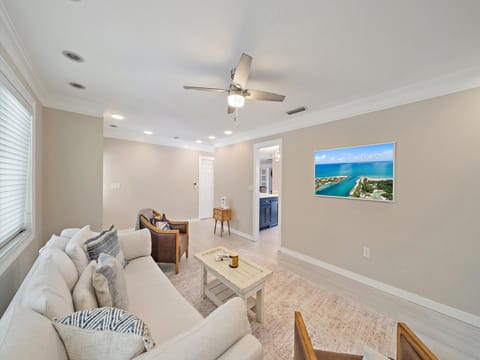 Cozy living area with Smart TV, perfect for family gatherings, movie night, or socializing after a day at the beach.