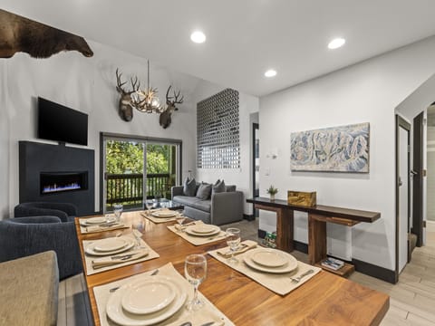 Snow Flower 126 has a dining area with seating for 8 guests.