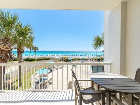 Soak up breathtaking beach views from your private balcony, where turquoise waters and palm trees create the perfect tropical escape.