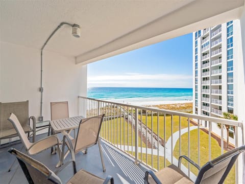 Sip your morning coffee on your private balcony while watching waves roll onto pristine sand below.