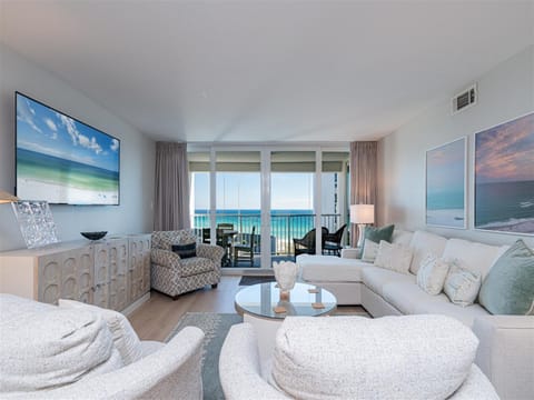 Relax in your oceanfront living room with stunning sea views through floor-to-ceiling windows and your private balcony awaiting.